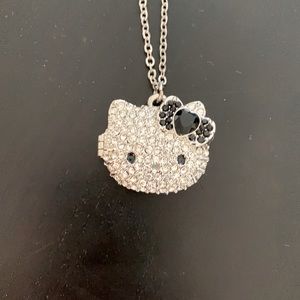 Hello Kitty silver locket with pave black & clear rhinestones